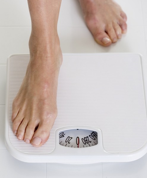 Eating Disorders - stepping onto scales